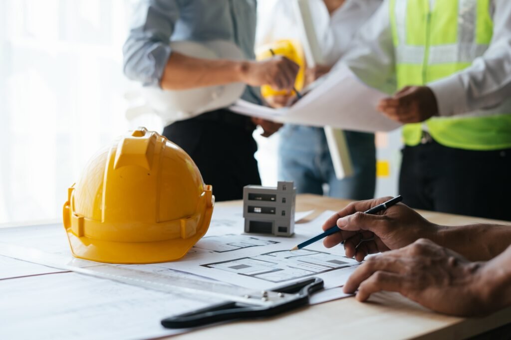 Engineers working together on a building project.